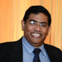 Dr Colonel John Chenetra